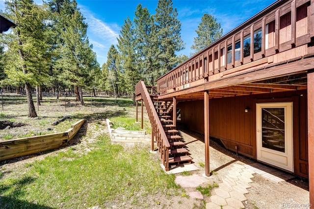 224 Yellow Pine Dr, Bailey, CO 80421 - view of yard featuring stairs and a deck