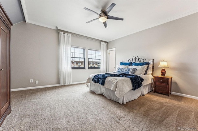 bedroom featuring carpet, baseboards, lofted ceiling, ceiling fan, and ornamental molding