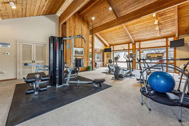 workout room with baseboards, carpet, wooden ceiling, and high vaulted ceiling