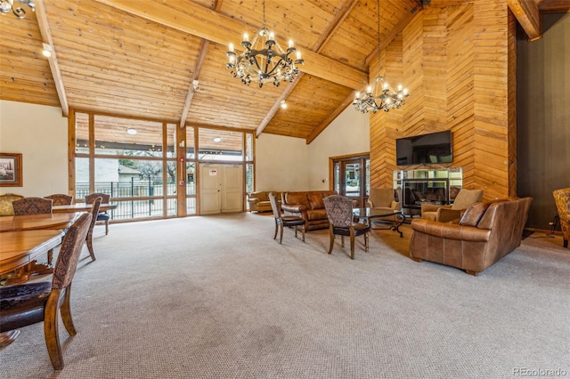 dining room featuring carpet, plenty of natural light, wood ceiling, beamed ceiling, and a chandelier