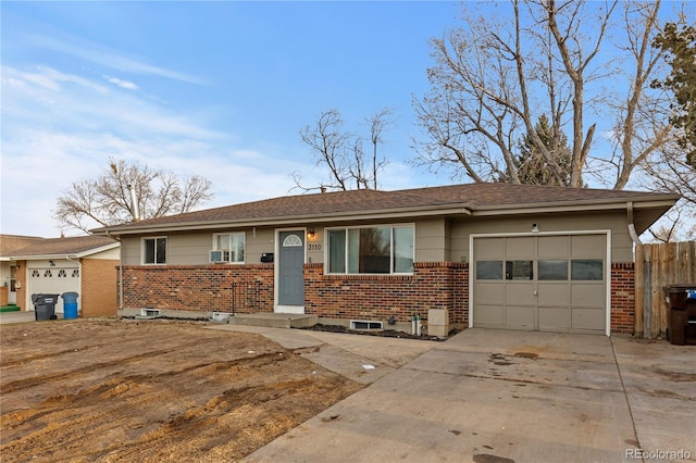 ranch-style home featuring a garage