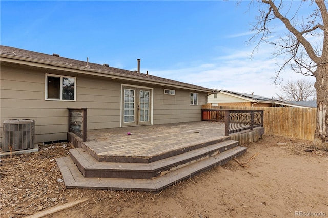 back of property featuring a deck and central air condition unit