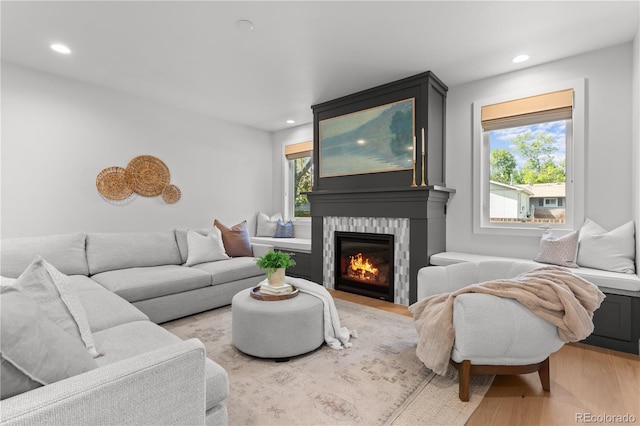 3256 S Corona, Englewood, CO 80113 - living room featuring light wood-style floors, recessed lighting, and a glass covered fireplace