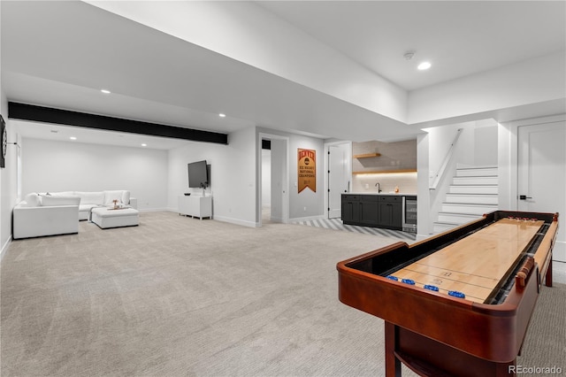 3256 S Corona, Englewood, CO 80113 - rec room featuring light colored carpet, bar with sink, baseboards, and recessed lighting