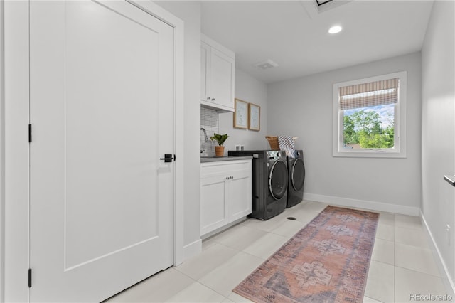 3256 S Corona, Englewood, CO 80113 - laundry area with washer and dryer, cabinet space, baseboards, light tile patterned floors, and recessed lighting