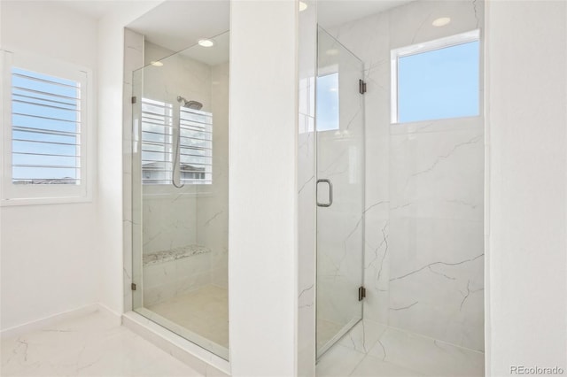 13960 Box Turtle Loop, Parker, CO 80134 - full bath featuring a marble finish shower, baseboards, and marble finish floor