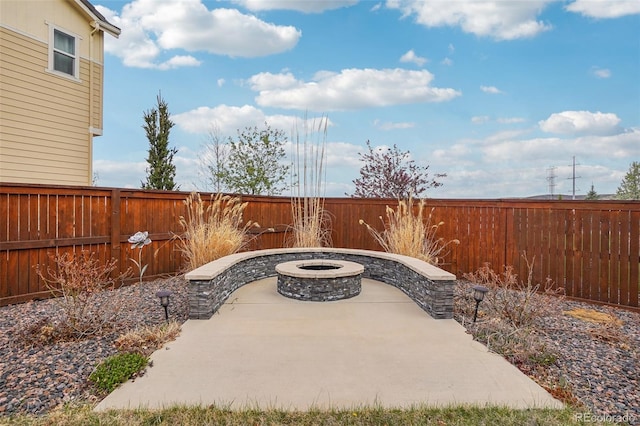 13960 Box Turtle Loop, Parker, CO 80134 - view of patio / terrace featuring a fenced backyard and a fire pit