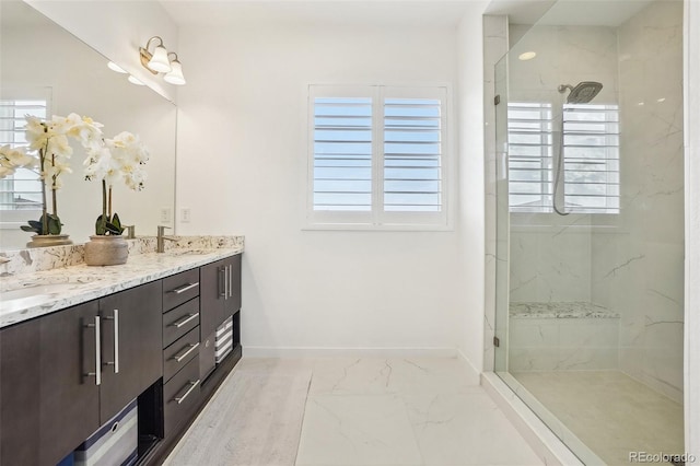 13960 Box Turtle Loop, Parker, CO 80134 - bathroom featuring a sink, a wealth of natural light, and marble finish floor