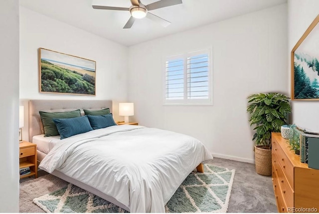 13960 Box Turtle Loop, Parker, CO 80134 - bedroom featuring ceiling fan, light carpet, and baseboards