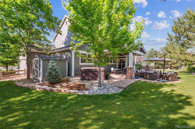 10660 Weathersfield Ct, Highlands Ranch, CO 80129 - back of house featuring a hot tub, a patio area, a storage shed, and an outdoor living space