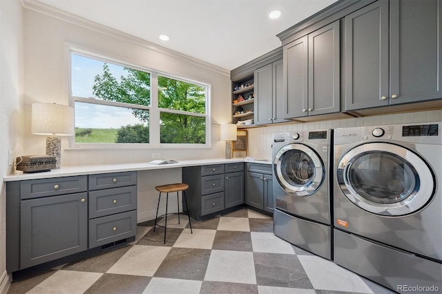 10660 Weathersfield Ct, Highlands Ranch, CO 80129 - laundry area with cabinet space, ornamental molding, washer and dryer, recessed lighting, and light flooring