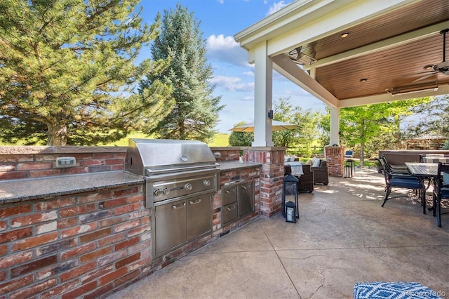 10660 Weathersfield Ct, Highlands Ranch, CO 80129 - view of patio / terrace with area for grilling, a ceiling fan, and outdoor dining space