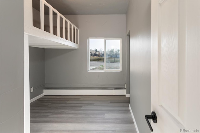 4595 S Lincoln St, Englewood, CO 80113 - unfurnished bedroom with baseboards and wood finished floors