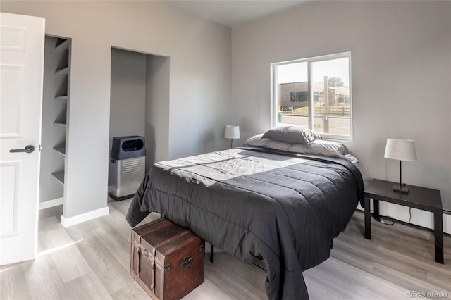 4595 S Lincoln St, Englewood, CO 80113 - bedroom featuring light wood-style floors and baseboards