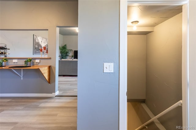 4595 S Lincoln St, Englewood, CO 80113 - corridor with light wood-style floors and baseboards