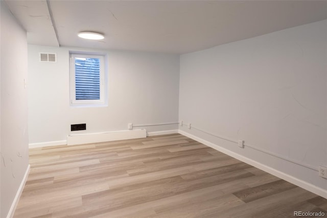 4595 S Lincoln St, Englewood, CO 80113 - unfurnished room with baseboards, light wood-style floors, and visible vents