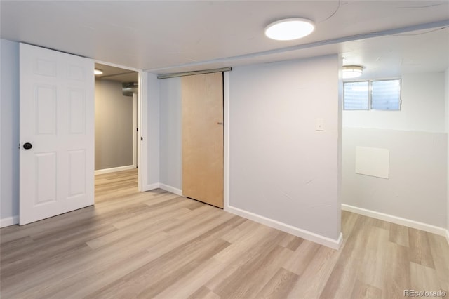 4595 S Lincoln St, Englewood, CO 80113 - unfurnished bedroom with a closet, light wood-style flooring, and baseboards