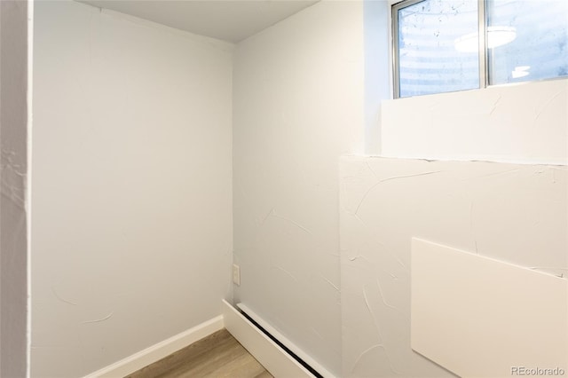4595 S Lincoln St, Englewood, CO 80113 - bathroom featuring wood finished floors and baseboards