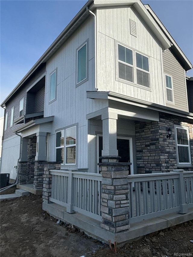 exterior space with covered porch and central AC unit