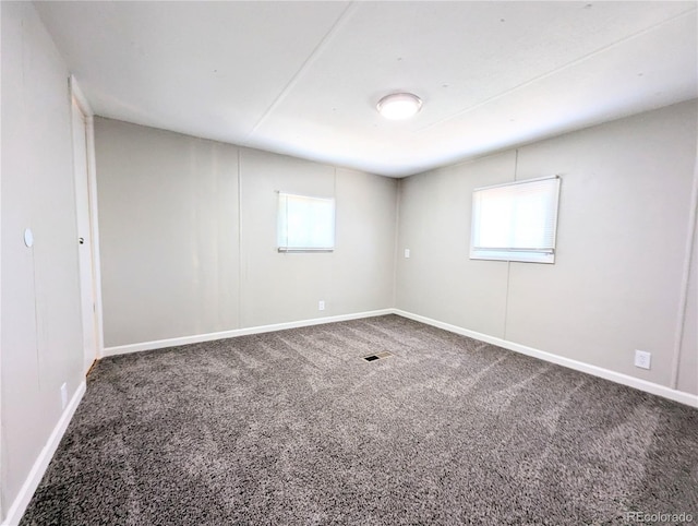 2032 Tulane St, Denver, CO 80260 - spare room featuring carpet floors and plenty of natural light