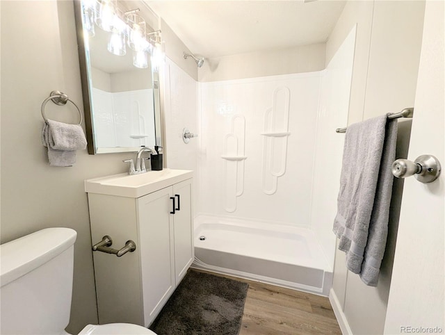 2032 Tulane St, Denver, CO 80260 - full bathroom with vanity, a shower, and wood finished floors