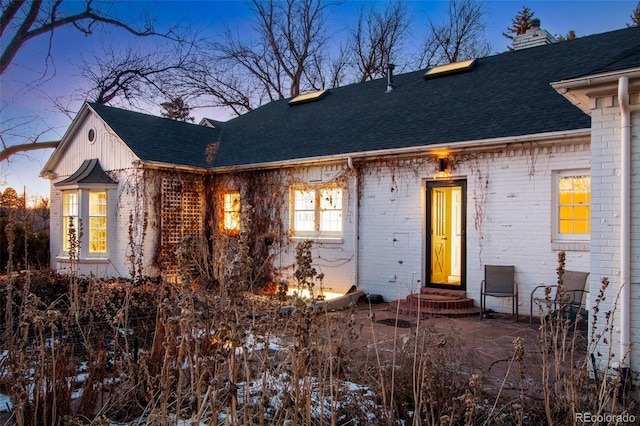 view of front of home with a patio area