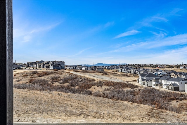 view of yard featuring a residential view