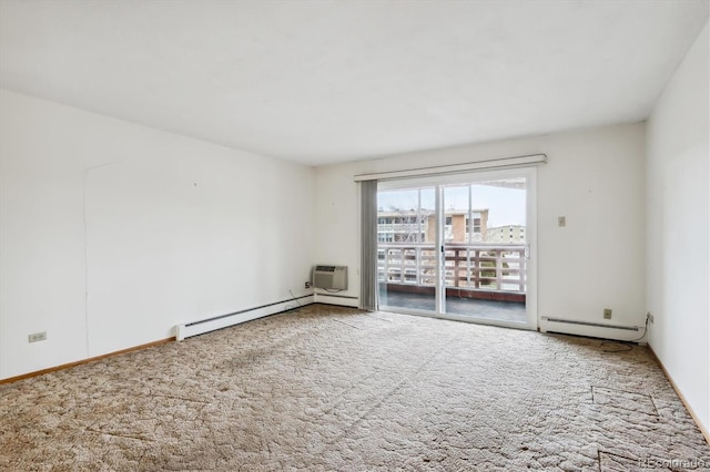 spare room with a baseboard heating unit, a wall mounted AC, and carpet floors