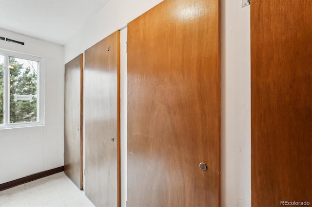 635 S Alton Way Unit 1C, Denver, CO 80247 - unfurnished bedroom with light floors and a closet