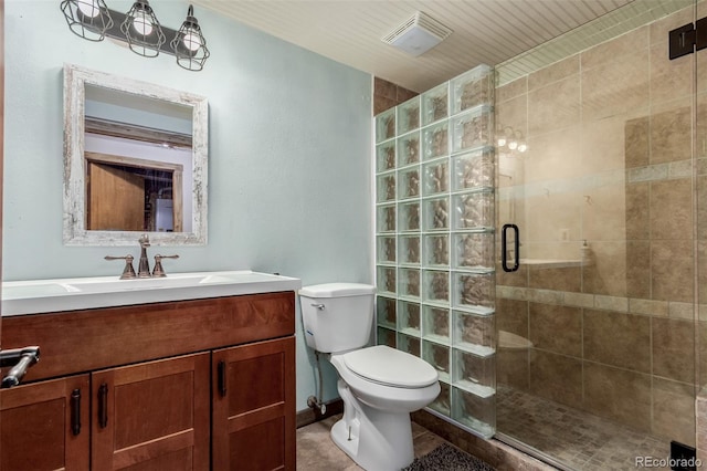 1341 Tomichi Dr, Franktown, CO 80116 - bathroom featuring toilet, a stall shower, and vanity