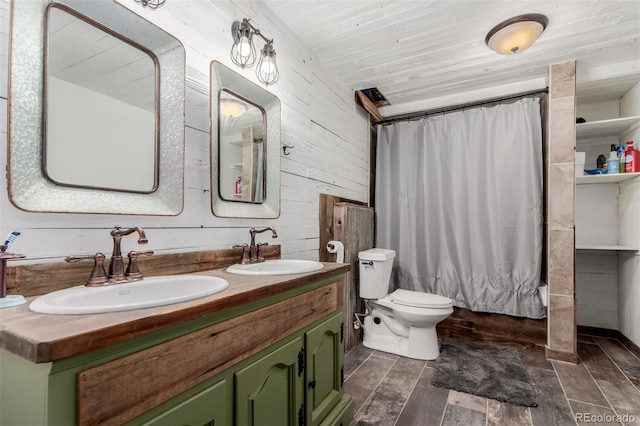 1341 Tomichi Dr, Franktown, CO 80116 - full bathroom with double vanity, wood walls, toilet, wood finished floors, and shower / tub combo with curtain