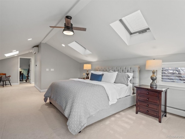 bedroom featuring lofted ceiling with skylight, ceiling fan, an AC wall unit, carpet floors, and a baseboard heating unit