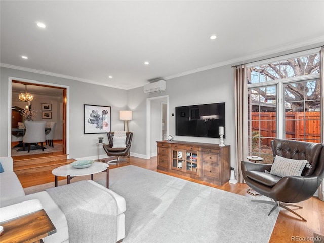 living room with crown molding, recessed lighting, a wall mounted AC, wood finished floors, and baseboards