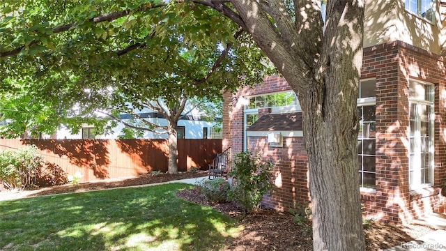 view of yard featuring fence