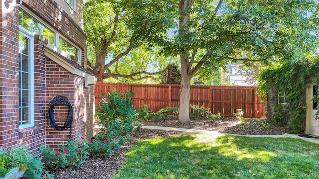 view of yard with fence