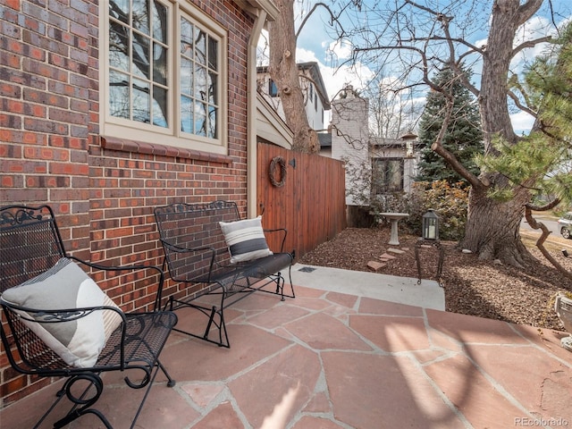 view of patio with fence