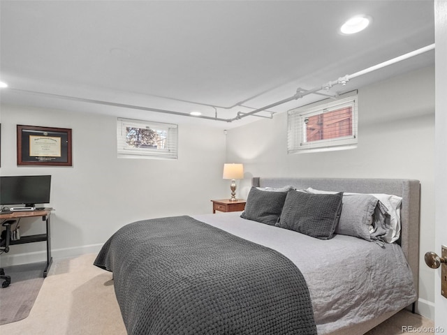 bedroom with baseboards and recessed lighting