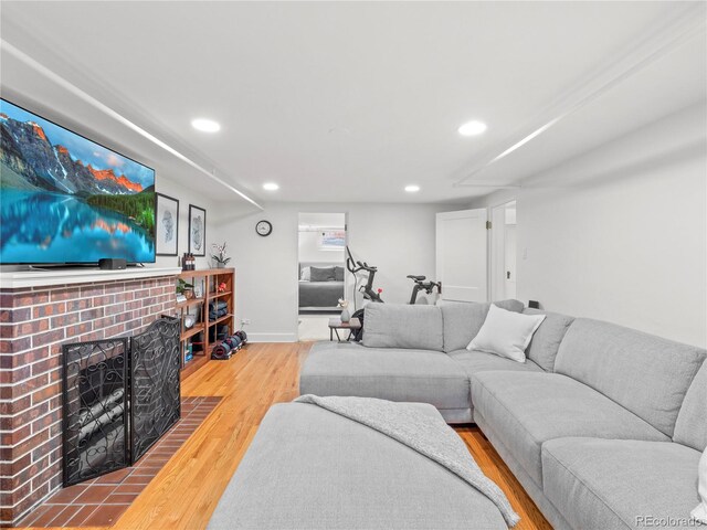 926 S Fillmore Way, Denver, CO 80209 - living area with wood finished floors, recessed lighting, and a fireplace