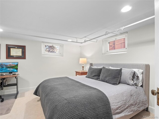 926 S Fillmore Way, Denver, CO 80209 - carpeted bedroom featuring baseboards, multiple windows, and recessed lighting