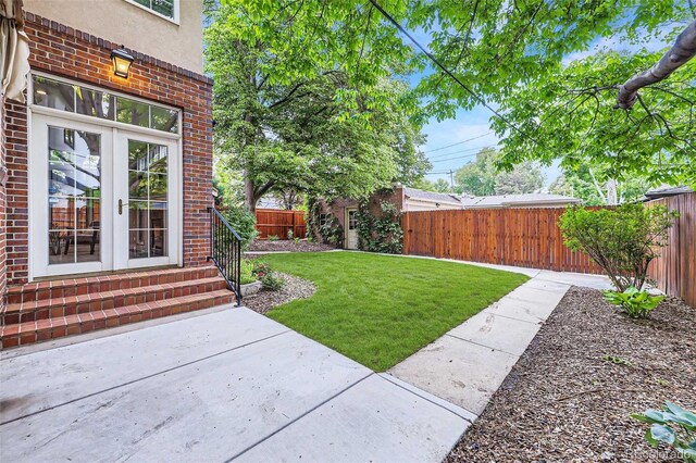 926 S Fillmore Way, Denver, CO 80209 - view of yard with a patio area, entry steps, and french doors