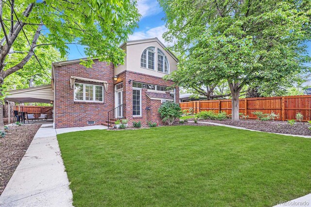 926 S Fillmore Way, Denver, CO 80209 - rear view of house featuring brick siding, stucco siding, a carport, a patio area, and crawl space