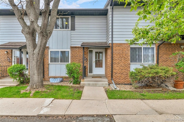 3061 W 92nd Ave Unit 8B, Westminster, CO 80031 - view of property featuring brick siding