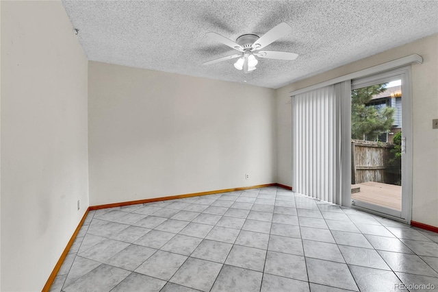 3061 W 92nd Ave Unit 8B, Westminster, CO 80031 - spare room with light tile patterned floors, baseboards, ceiling fan, and a textured ceiling