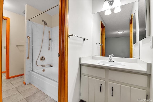 3061 W 92nd Ave Unit 8B, Westminster, CO 80031 - bathroom featuring vanity, shower / bathtub combination, tile patterned floors, a textured ceiling, and baseboards