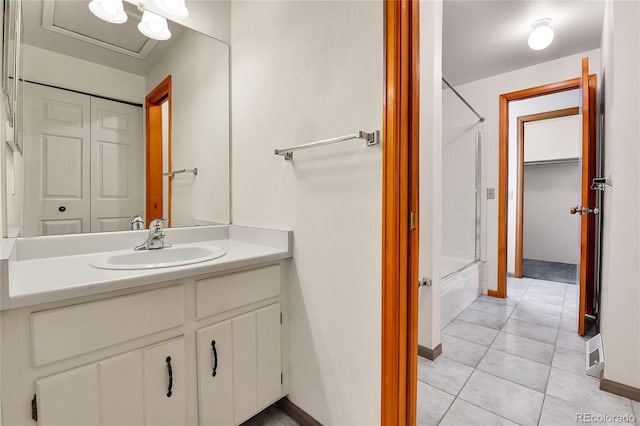3061 W 92nd Ave Unit 8B, Westminster, CO 80031 - bathroom featuring vanity, tile patterned flooring, a closet, and tub / shower combination