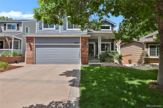 9665 Whitecliff Pl, Highlands Ranch, CO 80129 - view of front of home with brick siding, concrete driveway, a front lawn, and an attached garage