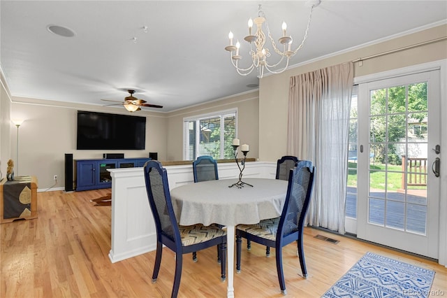 9665 Whitecliff Pl, Highlands Ranch, CO 80129 - dining area featuring ornamental molding, a chandelier, light wood finished floors, ceiling fan, and baseboards
