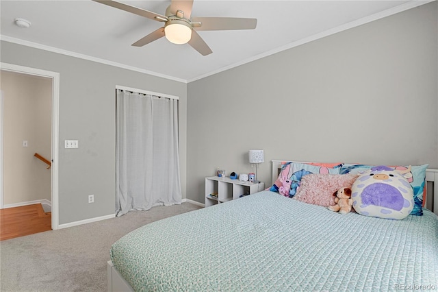 9665 Whitecliff Pl, Highlands Ranch, CO 80129 - bedroom with carpet floors, baseboards, ornamental molding, ceiling fan, and a closet