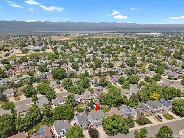 9665 Whitecliff Pl, Highlands Ranch, CO 80129 - aerial perspective of suburban area featuring a mountain backdrop