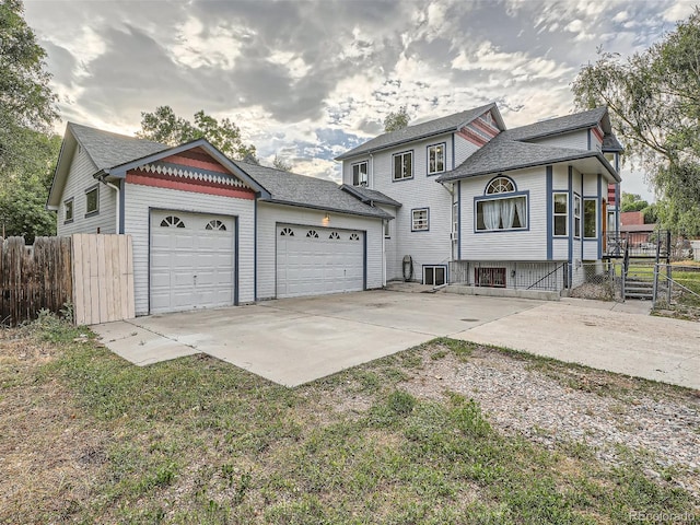 view of front of property with a garage